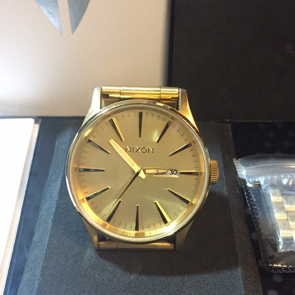 Gold Nixon watch
